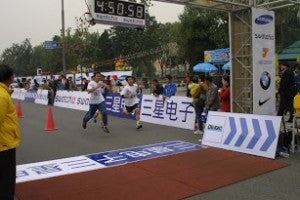 First timing service in China successfully finished in Beijing Marathon 2003